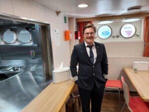 The most important person on R/V Skagerak: The chef, here smiling after the ship inauguration.